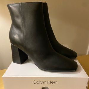Reduced: Calvin Klein Square Toe High Heel Dress Booties.
• Zipper
• Spot Clean